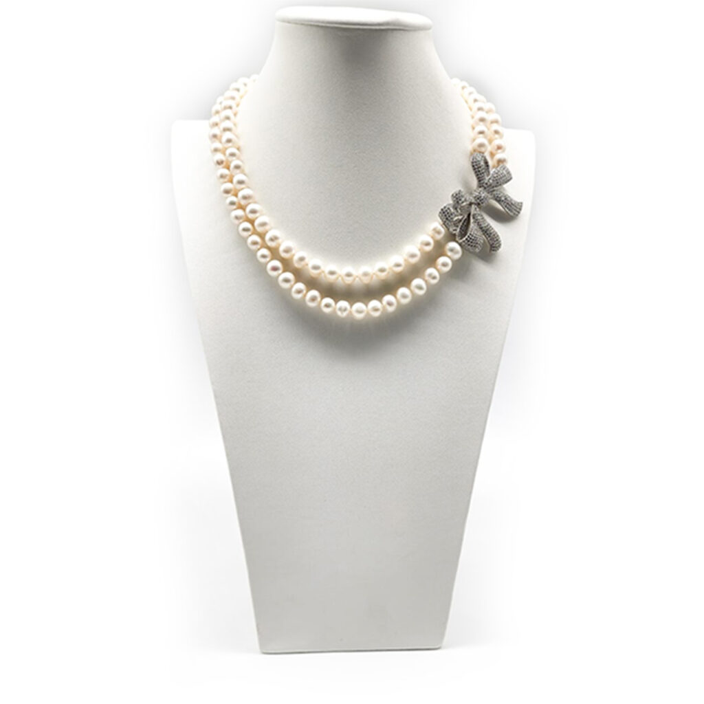 Double strand Bow pearl necklace on sterling silver with cubic zirconia