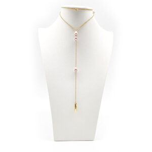 Dainty long drop pearl necklace on stainless gold placed with fresh water rice pearls