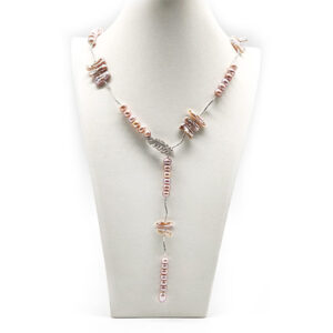 Fresh water keshi pearl leafe Lariat necklace on sterling silver.