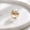 Waridi Ring -genuine pearl and layered petals with cubic zirconia in silver with a gold-plated finish