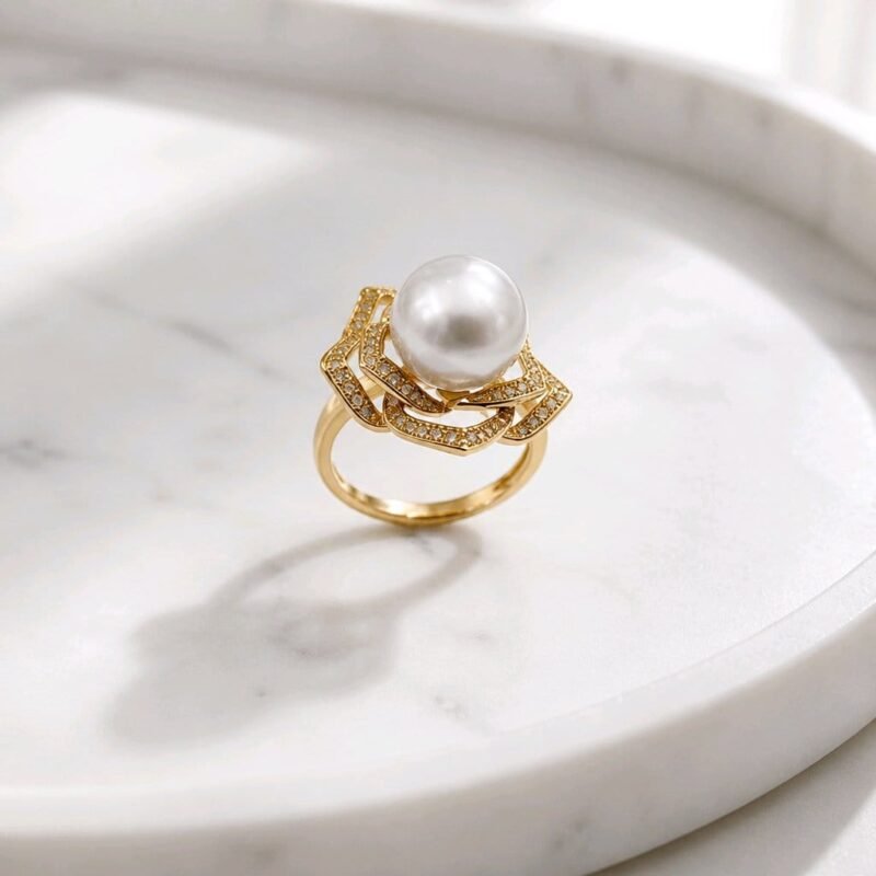 Waridi Ring -genuine pearl and layered petals with cubic zirconia in silver with a gold-plated finish