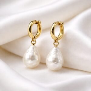 Amara Earrings- baroque pearls suspended from classic hoop in sterling silver with a gold-plated finish