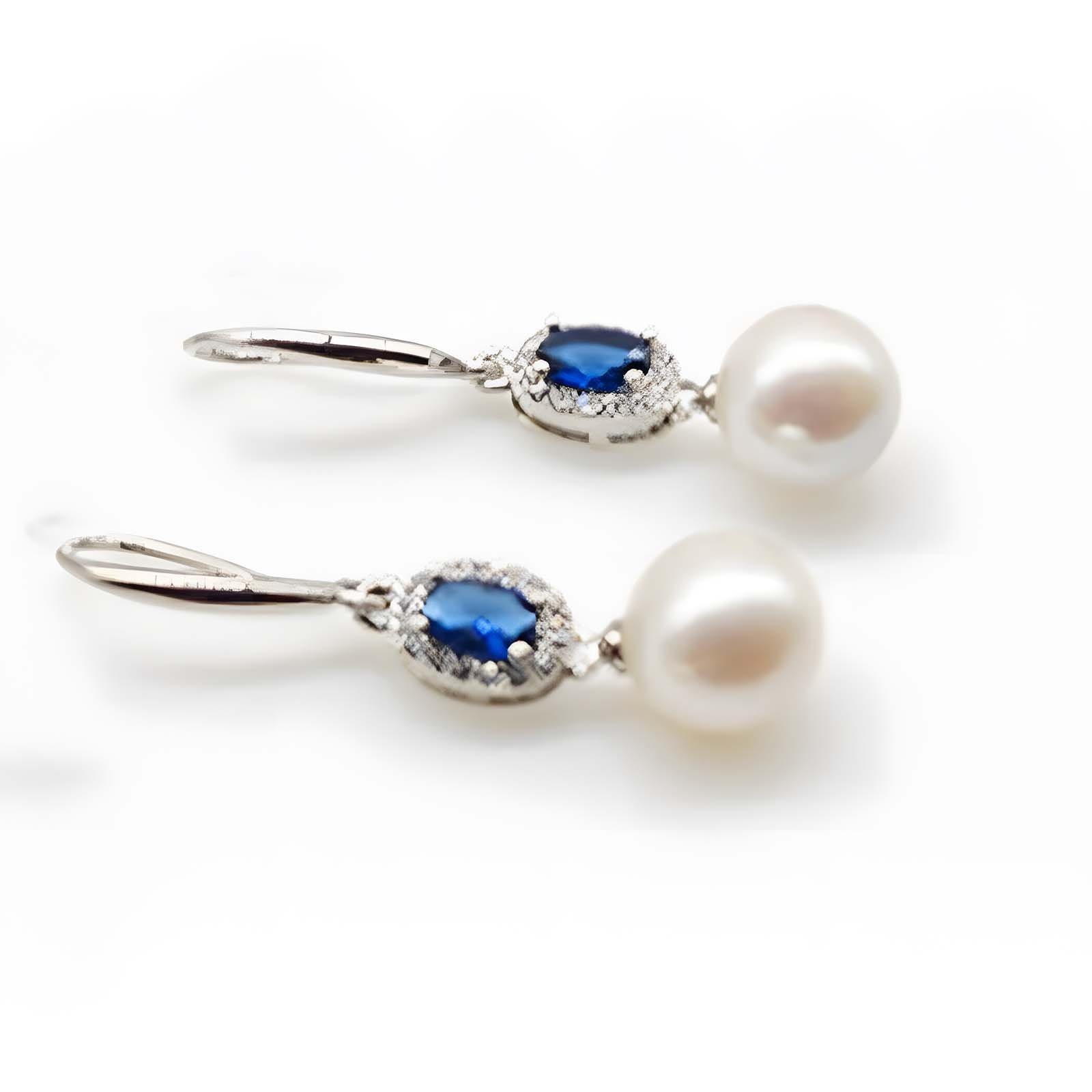 Fresh water Pearl Drop earrings on sterling silver and detailed with cubic Zirconia - White