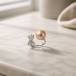 Tabasamu Ring - peach freshwater pearl with sparkling cubic zirconia in sterling silver
