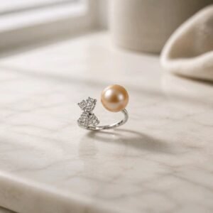 Tabasamu Ring - peach freshwater pearl with sparkling cubic zirconia in sterling silver