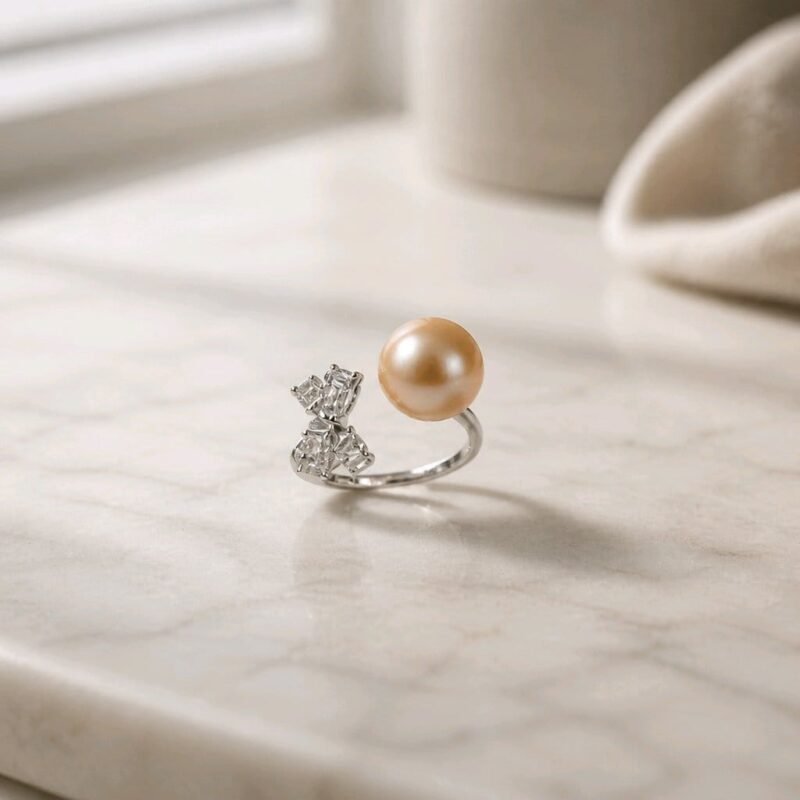 Tabasamu Ring - peach freshwater pearl with sparkling cubic zirconia in sterling silver