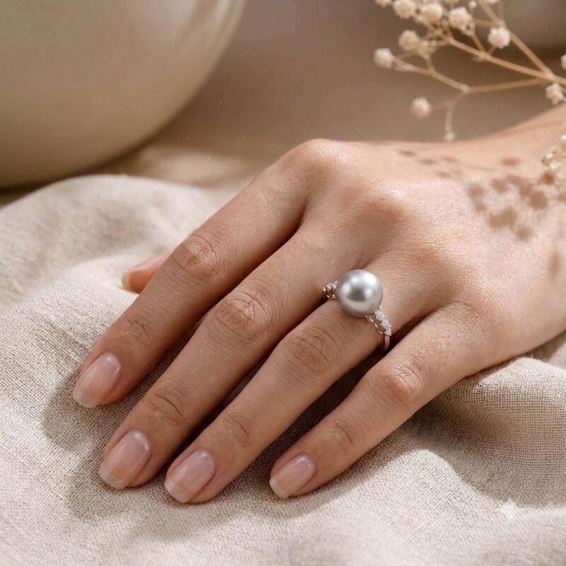 Amani Ring- freshwater pearl set on a cubic zirconia, handcrafted in sterling silver